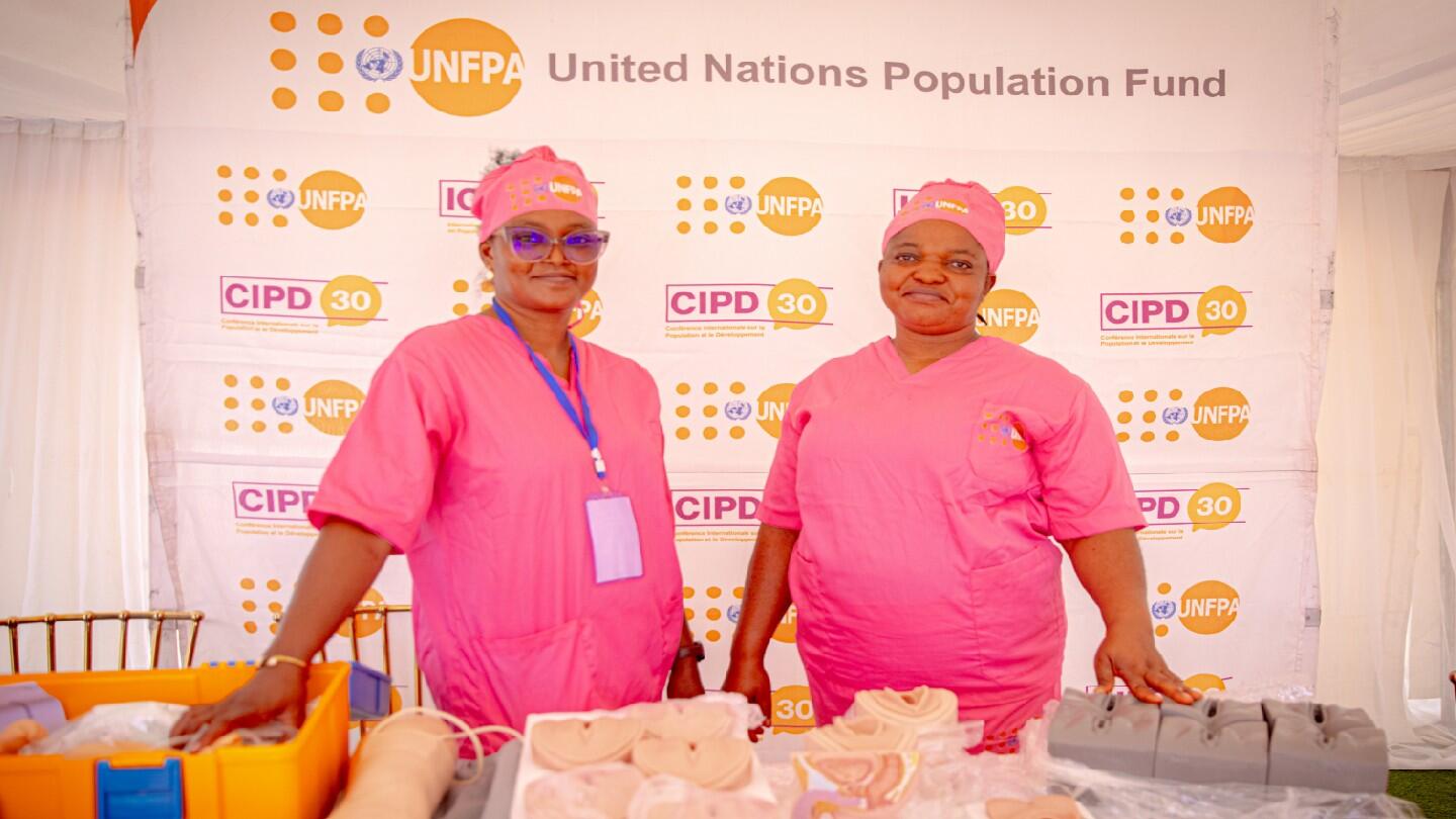 Laila and Laura, UNFPA Cameroon Humanitarian midwives presenting midwifery training equipment. Photo: @UNFPACameroon/Felix Fokoua